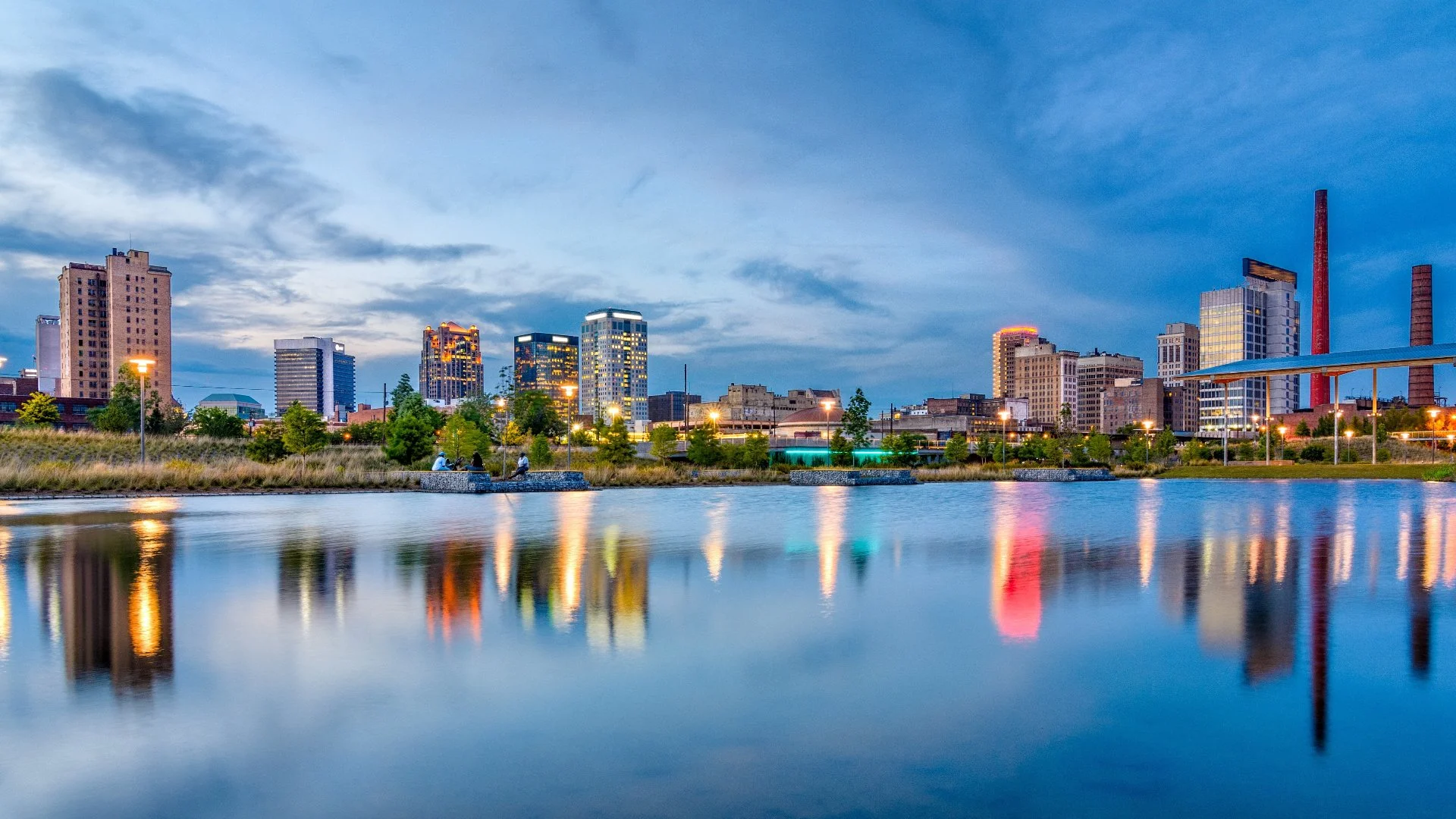 Birmingham, AL skyline with lake.