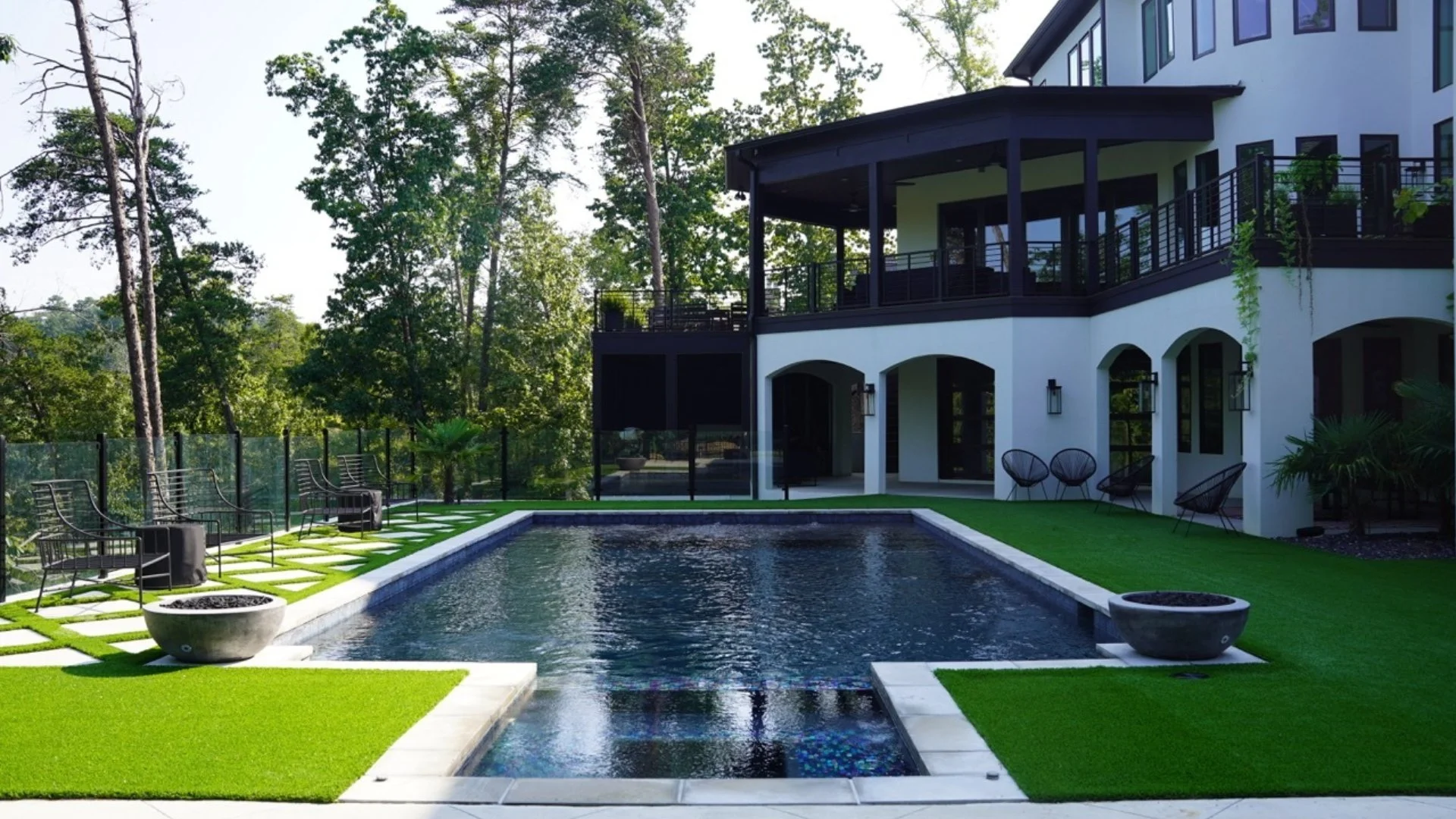 Home in Mountain Brook, AL with pool and artificial turf.