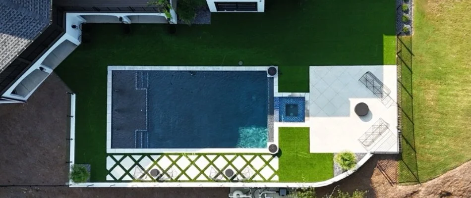 Backyard in Moores Mill, AL, with a pool and a patio.