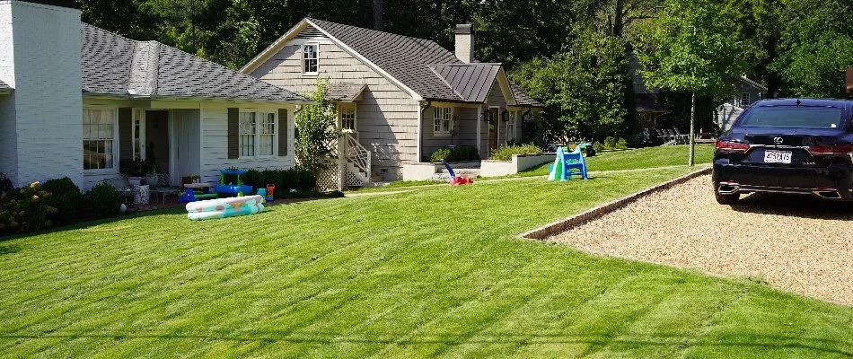 House in Hazel Green, AL, with a freshly mowed lawn.