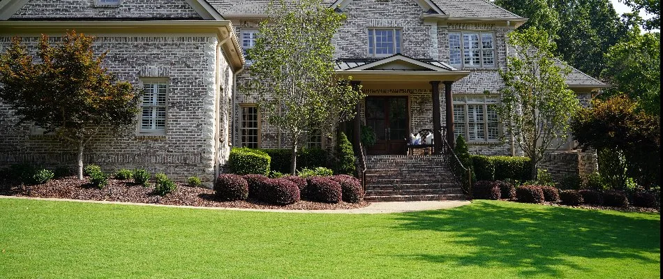 Liberty Park, AL home with a freshly mowed lawn with stripes.