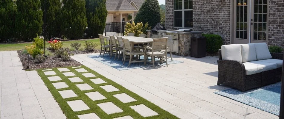 Paver patio with furniture and outdoor kitchen in Mountain Brook, AL.