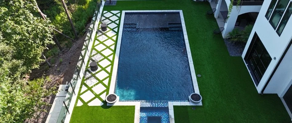 Pool next to artificial turf in Mountain Brook, AL.