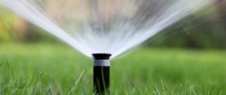 Sprinkler irrigation system on a lawn in Homewood, AL.