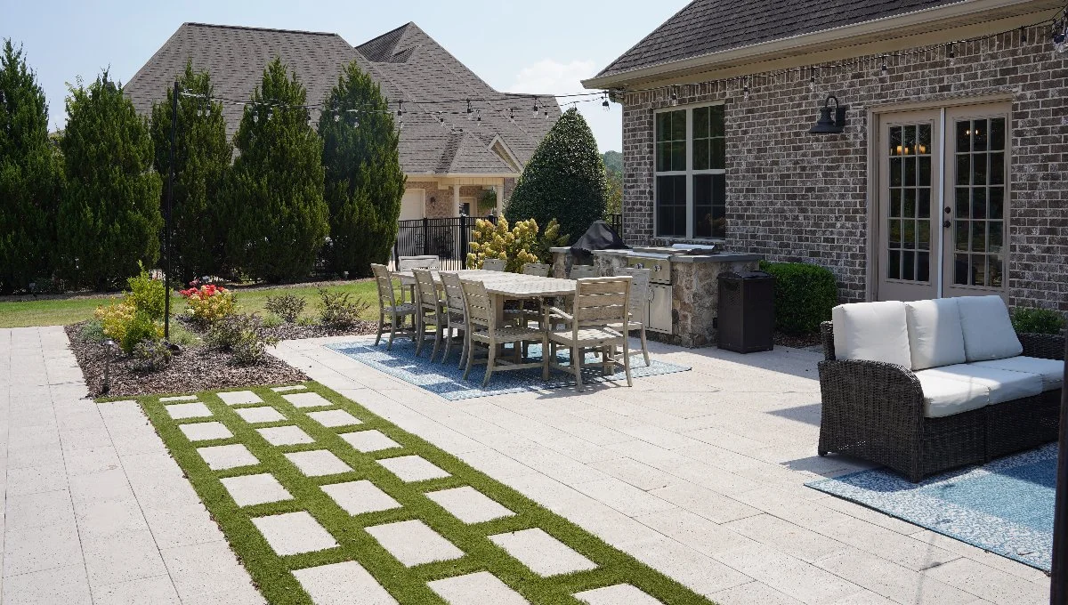 Paver patio with outdoor kitchen and seating